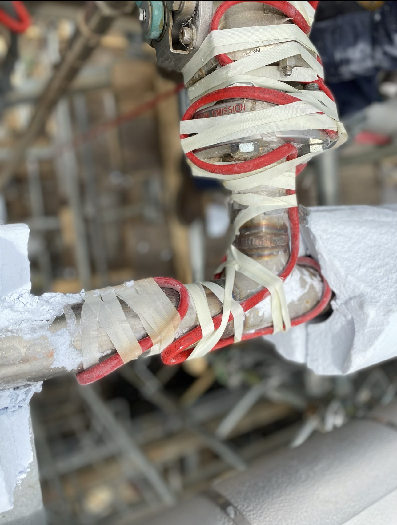 Heat-trace cable installed on industrial piping and equipment