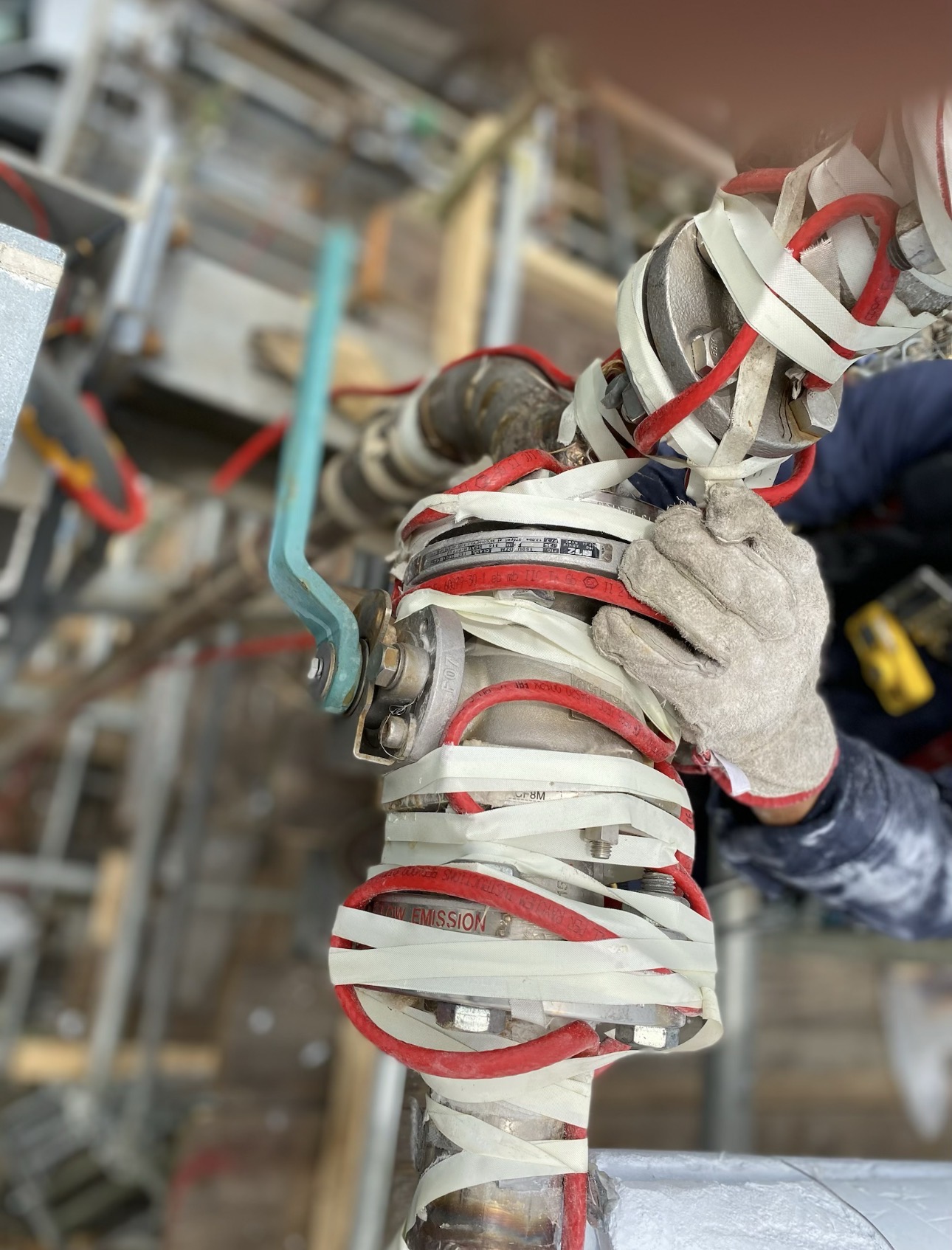 Heat-trace cable installed on industrial piping and equipment