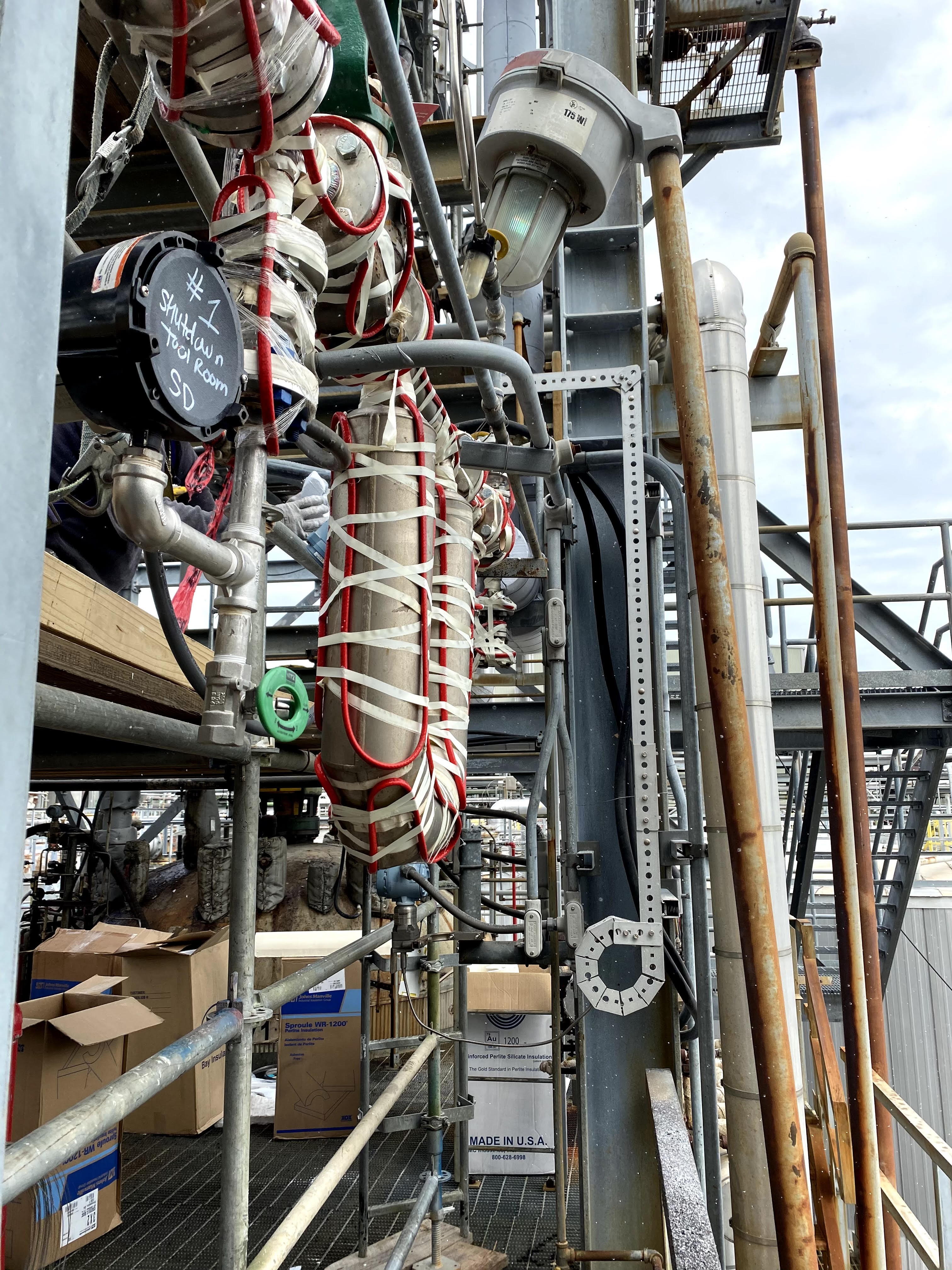 Heat-trace cable installed on industrial piping and equipment