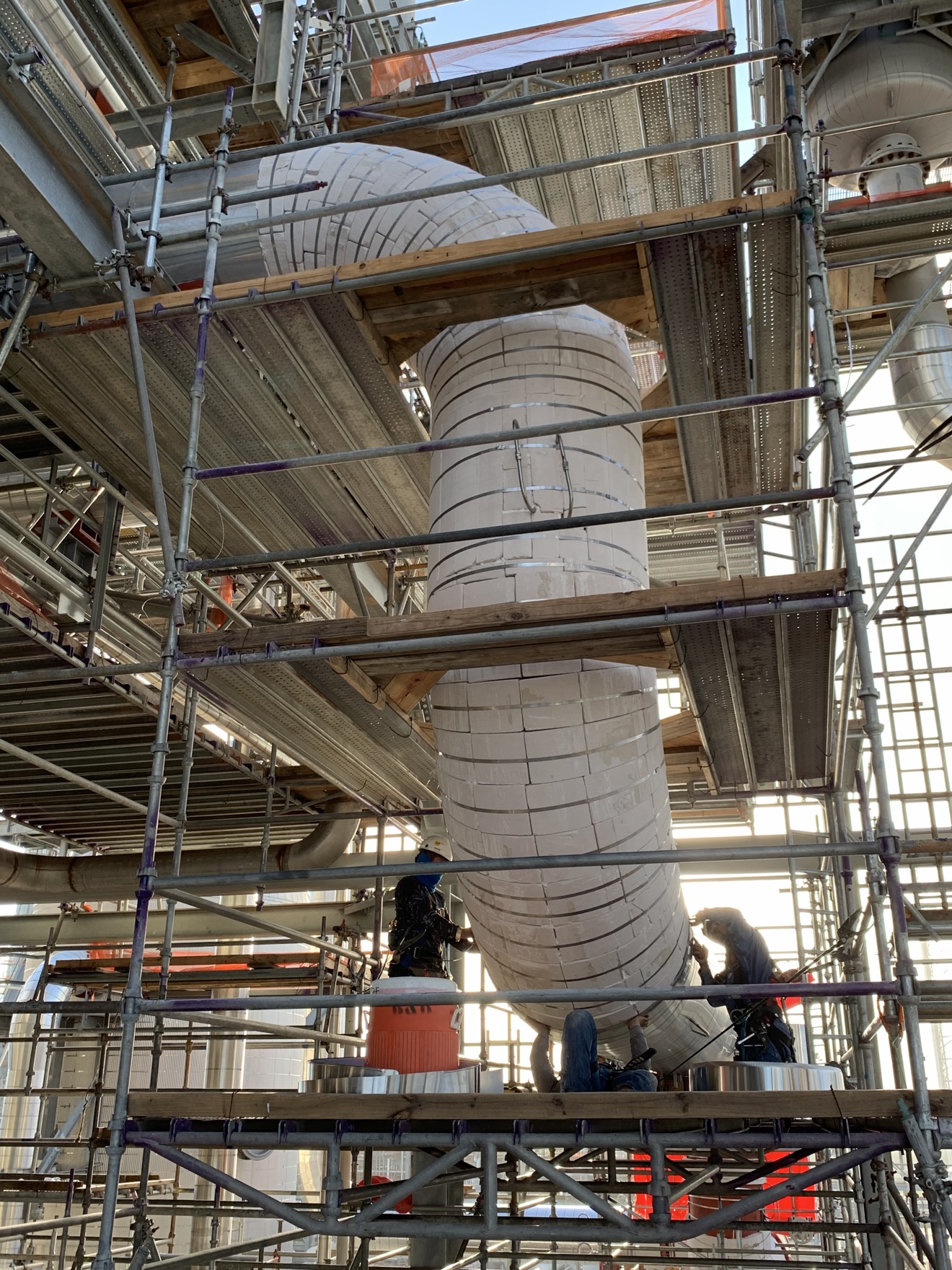 Industrial insulation work on piping, vessels and equipment