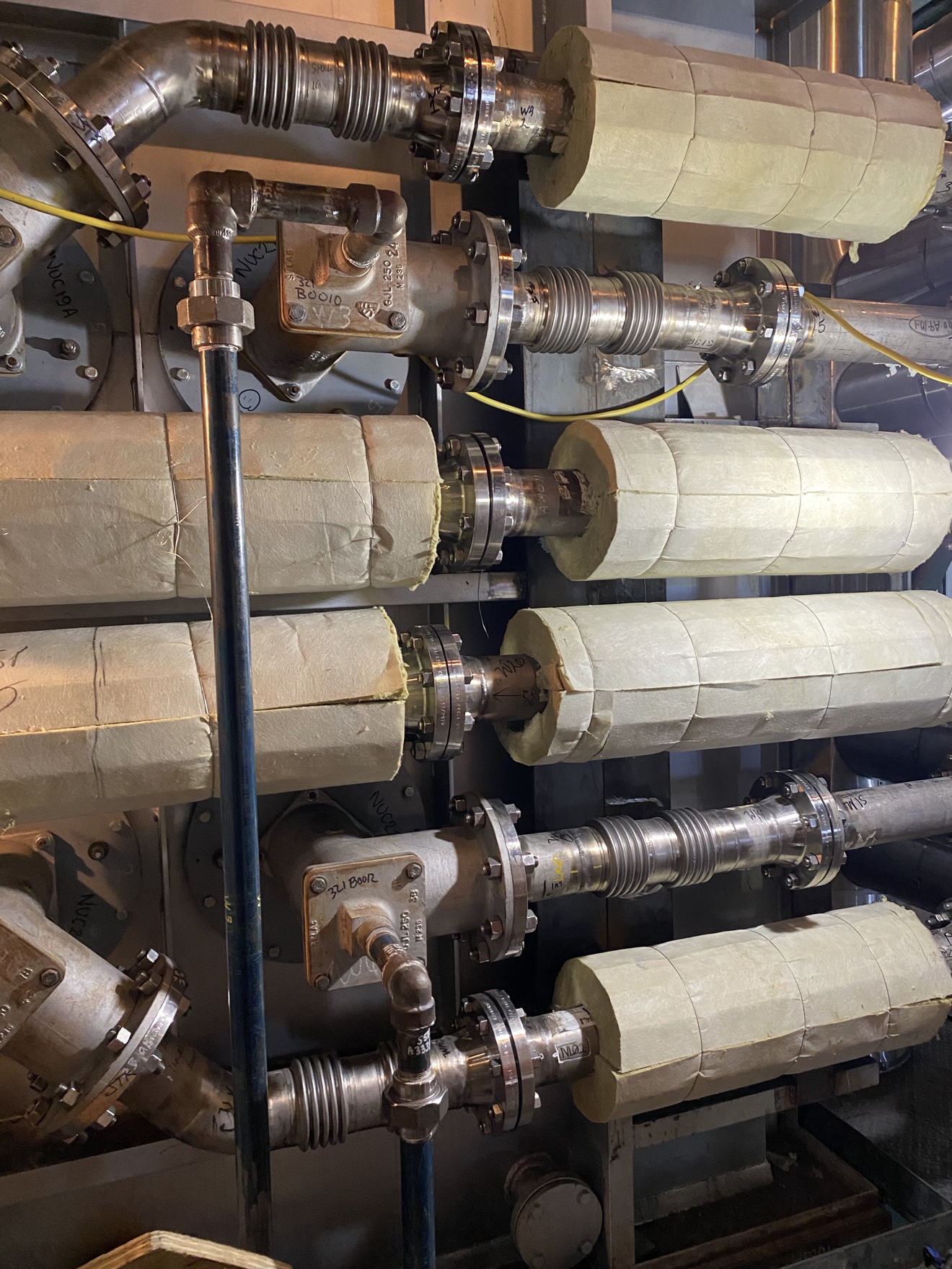 Industrial insulation work on piping, vessels and equipment