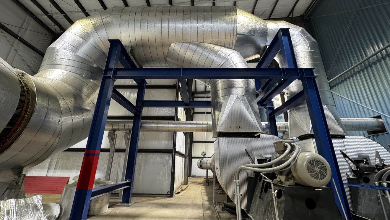 Finished metal jacketing protecting industrial insulation