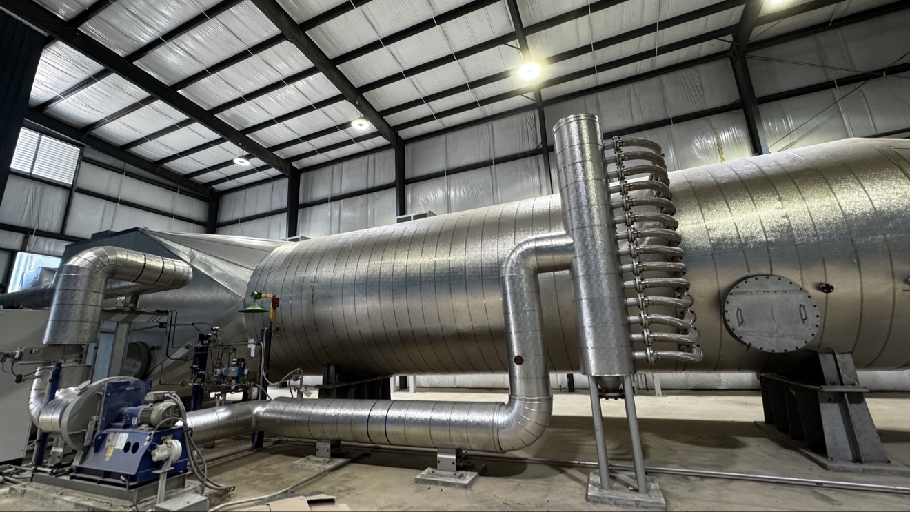 Finished metal jacketing protecting industrial insulation