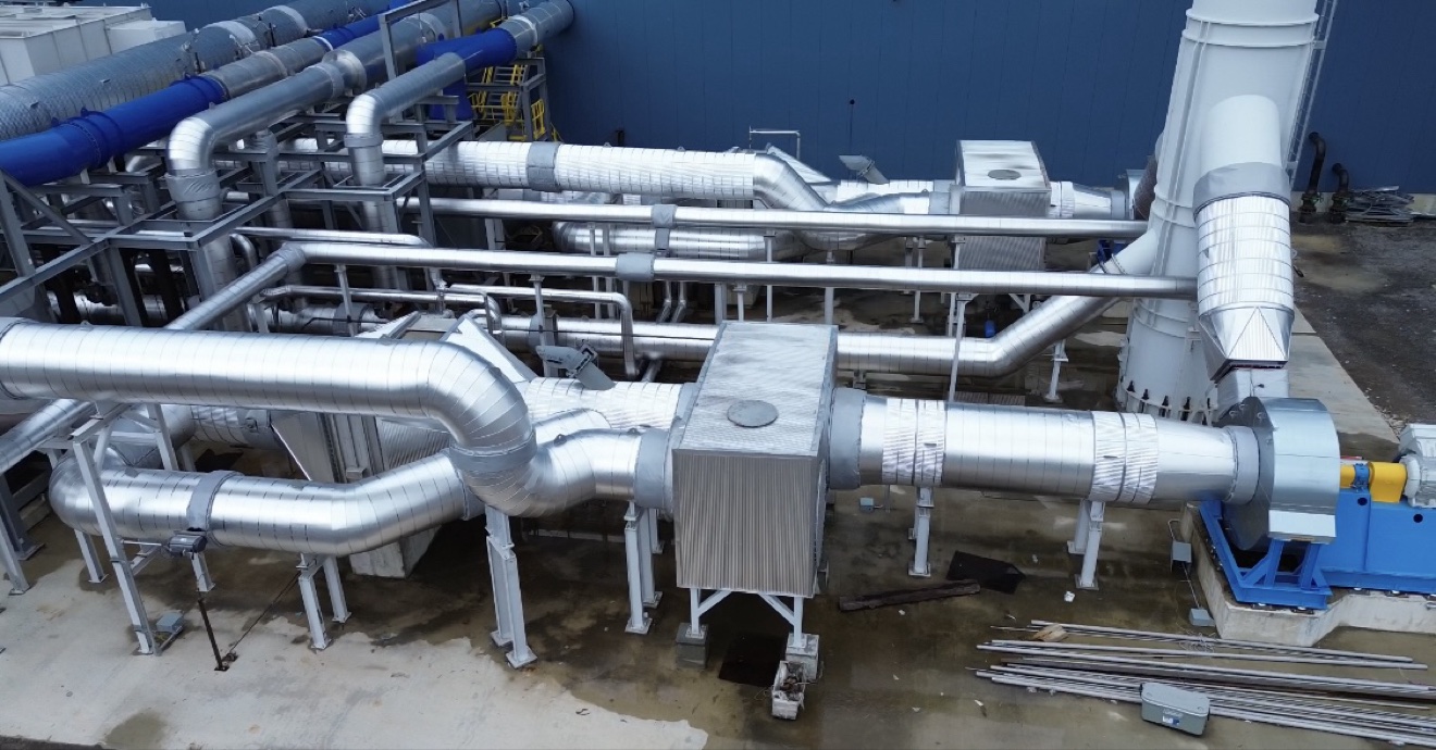 Finished metal jacketing protecting industrial insulation